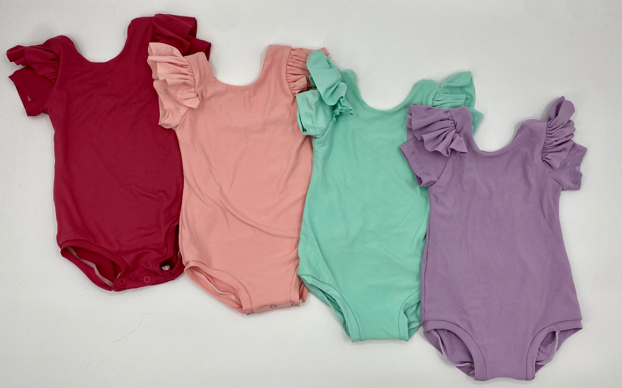 12m,18m,2T, &3T Lined leos with Ruffles & Snaps!